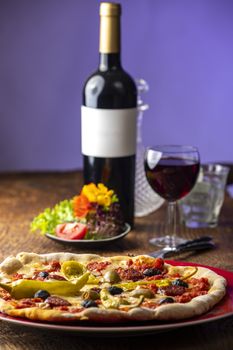 fresh pizza with red wine