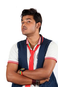 A young Indian guy wth questioning or doubting gesture, on white studio background.