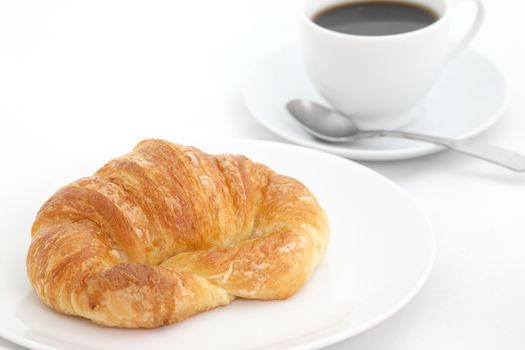 croissant with coffee isolated in white background