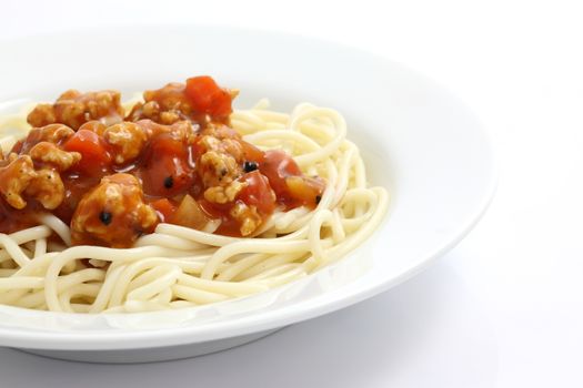 spaghetti with tomato sauce isolated in white background