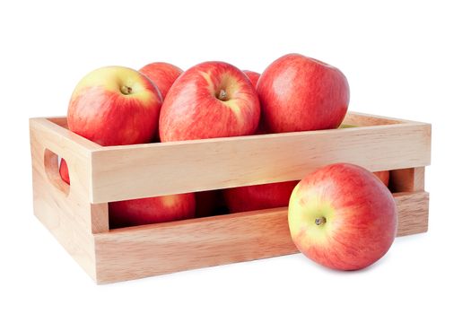 Apple fruit in wooden box isolate on white background with clipping path.