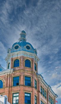 A cupola and dome on an old brick building in Quebec City, Quebec, Canada