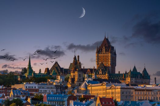 The skyline of Quebec City at Sunset with hotel at the crest of the hill