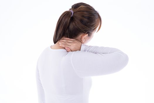 A woman feeling exhausted and suffering from shoulder and neck pain and injury on isolated white background. Health care and medical concept.