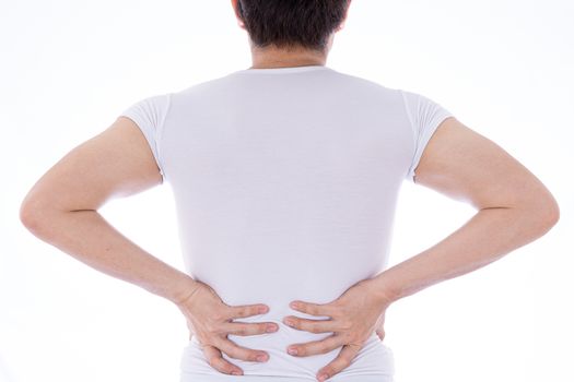A man feeling exhausted and suffering from waist and back pain and injury on isolated white background. Health care and medical concept.
