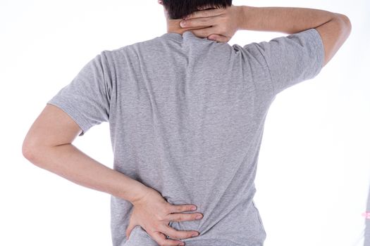 A man feeling exhausted and suffering from neck and back pain and injury on isolated white background. Health care and medical concept.