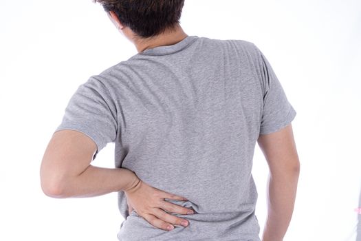 A man feeling exhausted and suffering from waist and back pain and injury on isolated white background. Health care and medical concept.