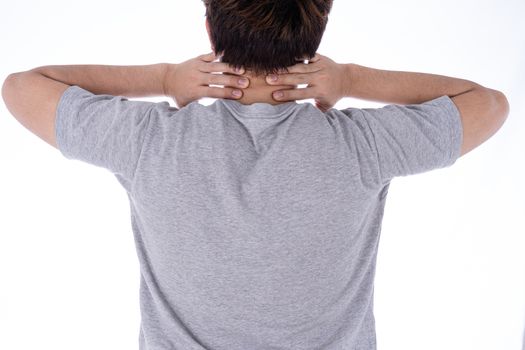 A man feeling exhausted and suffering from shoulder and neck pain and injury on isolated white background. Health care and medical concept.