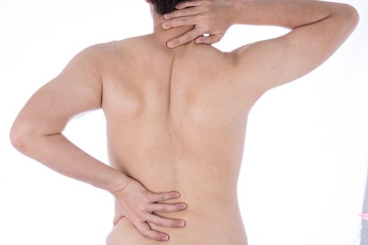 A man feeling exhausted and suffering from neck and back pain and injury on isolated white background. Health care and medical concept.