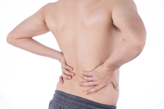 A man feeling exhausted and suffering from waist and back pain and injury on isolated white background. Health care and medical concept.