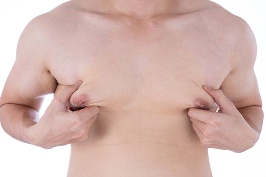 Close up man holding men boobs on white background. Diet, weight loss, slim body, healthy lifestyle concept.