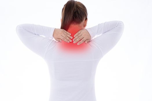 A woman feeling exhausted and suffering from shoulder and neck pain and injury on isolated white background with red spot. Health care and medical concept.