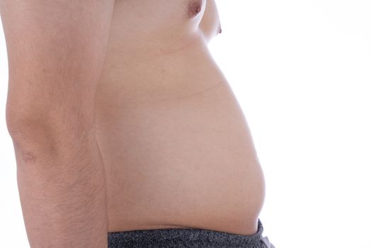 Close up the excessive fat belly on isolated white background. Man overweight abdomen. Man diet lifestyle concept reduce belly and shape up healthy stomach muscle. Weight loss, slim body concept.