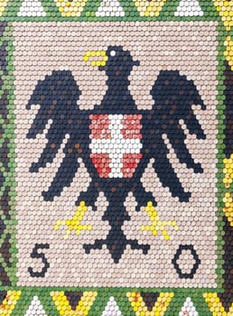 Austrian coat of arms on roof of Stephansdom cathedral, Vienna, Austria