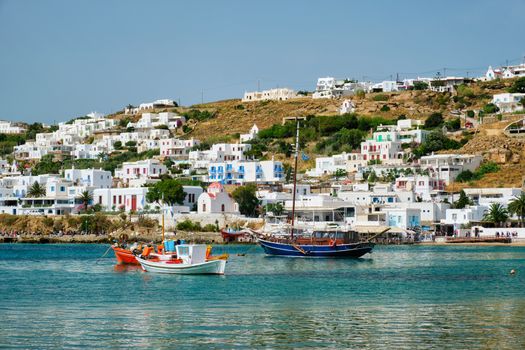 Mykonos port with fishing boats and yachts and vessels. Mykonos island, Greece