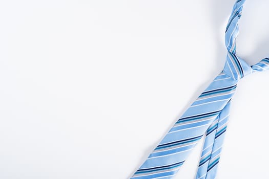 Happy Father Day background concept with blue necktie on white background with copy space for text.