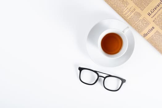 Happy Father Day background concept with newspaper, glasses and cup of tea on white background with copy space for text.