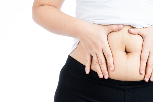 Fat woman holding excessive fat belly, overweight fatty belly isolated on over white background. Diet lifestyle, weight loss, stomach muscle, healthy concept.