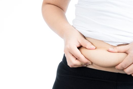 Fat woman holding excessive fat belly, overweight fatty belly isolated on over white background. Diet lifestyle, weight loss, stomach muscle, healthy concept.