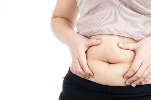 Fat woman holding excessive fat belly, overweight fatty belly isolated on over white background. Diet lifestyle, weight loss, stomach muscle, healthy concept.