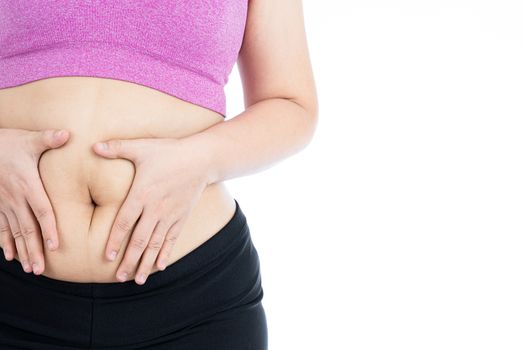 Fat woman holding excessive fat belly, overweight fatty belly isolated on over white background. Diet lifestyle, weight loss, stomach muscle, healthy concept.