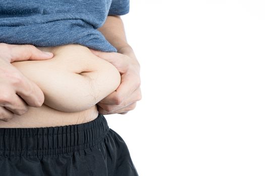 Fat man holding excessive fat belly, overweight fatty belly isolated on over white background. Diet lifestyle, weight loss, stomach muscle, healthy concept.