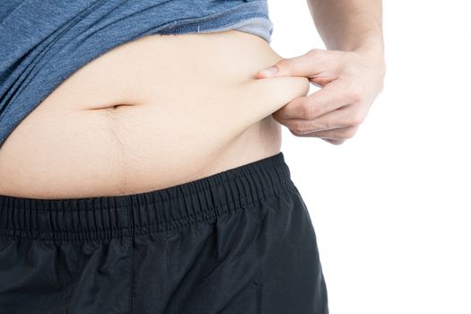 Fat man holding excessive fat belly, overweight fatty belly isolated on over white background. Diet lifestyle, weight loss, stomach muscle, healthy concept.