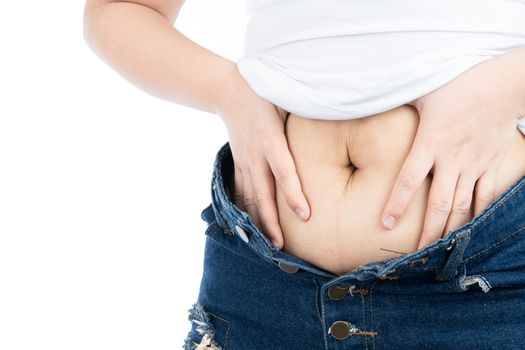 Fat woman holding excessive fat belly, overweight fatty belly isolated on over white background. Diet lifestyle, weight loss, stomach muscle, healthy concept.
