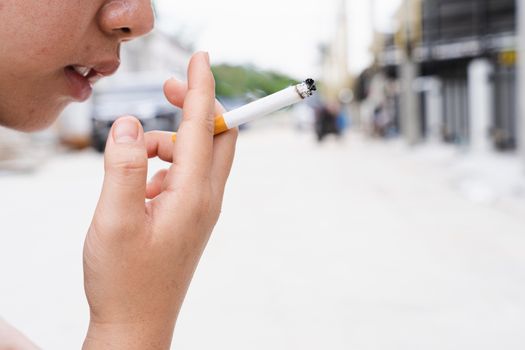 Close-up of someone light a cigarette. World no tobacco day concept