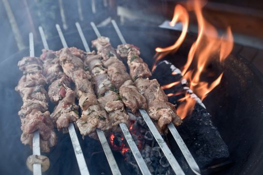 Original russian shashlik meat on fire. Barbeque like russians.