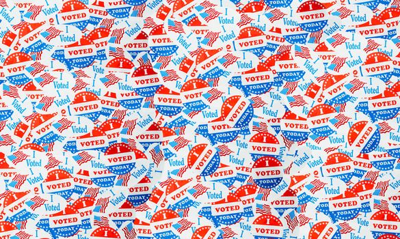 Many voting stickers given to US voters in Presidential election for background to illustrate vote rights