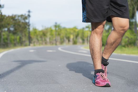 Close-up of Athlete shoes while running and walking in park. Sport and exercise concept