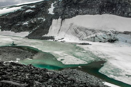 Beautiful glacier water at the Galdhøpiggen mountain in Norway.