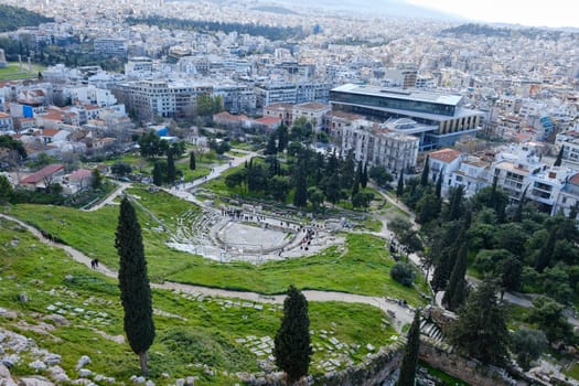 Athens, Greece - FEB 16, 2020 - Panoramic view of the Theatre of Dionysus at the foot of Acropolis in Athens, Greece.