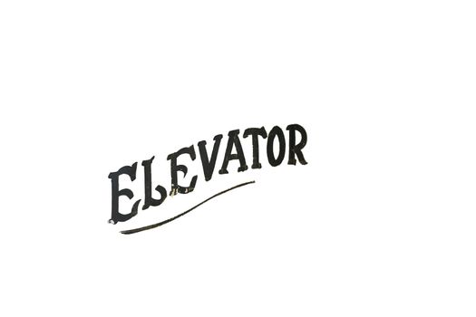 Old Fashioned and Worn Black Text That Says Elevator on a Pure White Background
