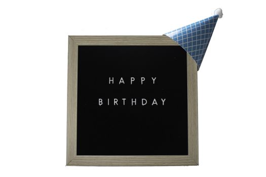 A Birch Framed Sign That Says Happy Birthday in White Letters With a Light Blue Party Hat on Top on a Pure White Background