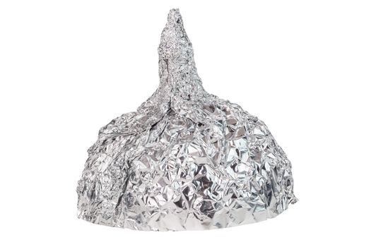 Aluminium foil hat isolated on white background, symbol for conspiracy theory and mind control protection. Close-up.