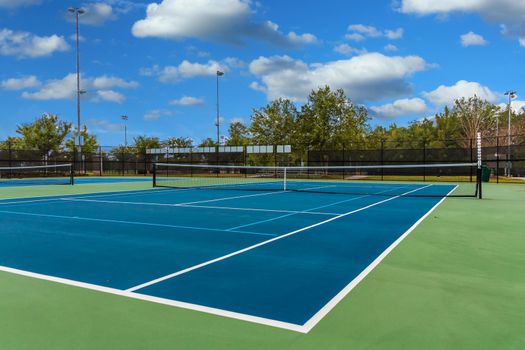 A Nice Green Tennis Court in a Local County Park