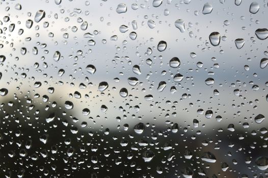 Drops of rain on the window, shallow dof.