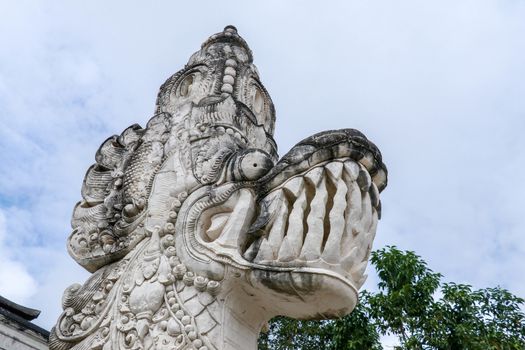 Stone sculptures of asian dragons in Pura Lempuyang temple on Bali, Indonesia. Close up.