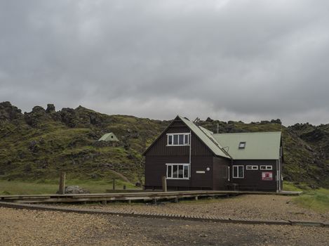 Iceland, Landmannalaugar, July 30, 2019: Landmannalaugar camp site mountain cottage. Iceland start of famous Laugavegur trek. Moody sky