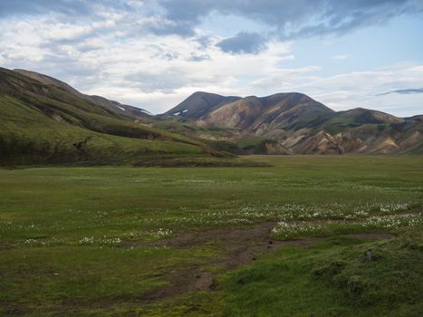 Colorful Rhyolit mountain panorma with multicolored volcanos in Landmannalaugar area of Fjallabak Nature Reserve in Highlands region of Iceland.