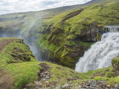 Beautifull waterfall on the Skoga River with no people on famous Fimmvorduhals trail second part of Laugavegur trek. Summer landscape on a sunny day. Amazing in nature. August 2019, South Iceland.