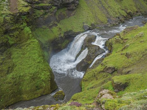 Beautifull waterfall on the Skoga River with rainbow and no people on famous Fimmvorduhals trail second part of Laugavegur trek. Summer landscape on a sunny day. Amazing in nature. August 2019, South Iceland.