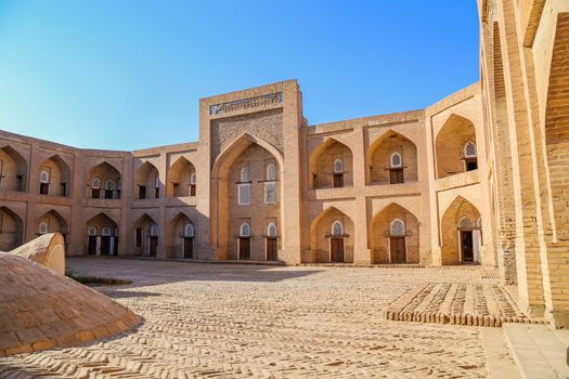 KHIVA, UZBEKISTAN: The exterior of the Qutlugh Murad Inaq Madrassa in Khiva, Uzbekistan. UNESCO heritage site