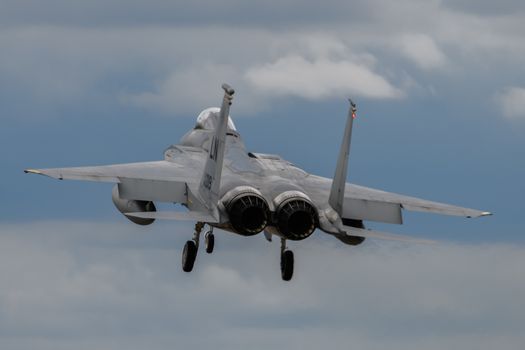 Boeing F-15 fighter jet landing at RAF Lakenheath in England