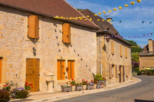 Street with historical houses in Saint-Leon-sur-Vezere, Dordogne,France