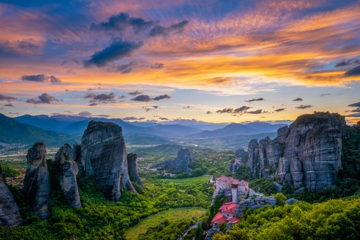 Monastery of Rousanou and Monastery of St. Nicholas Anapavsa in famous greek tourist destination Meteora in Greece on sunset