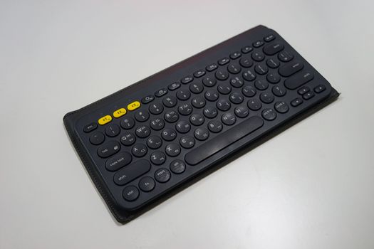 Black computer keyboard on white background
