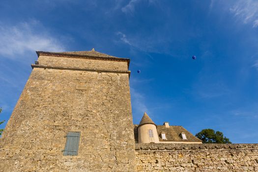 Dordogne, France: Hot air balloons flying over Dordogne in the Castle of the Jardins de Marqueyssac in the Dordogne region of France